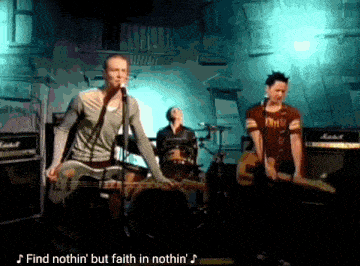 a man singing into a microphone with the words find nothin ' but faith in nothin ' on the bottom