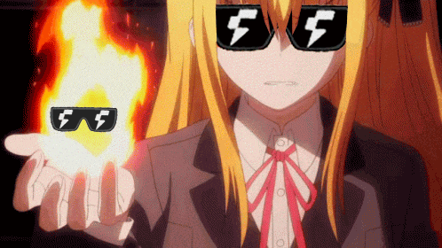 a girl wearing sunglasses with the letter f on them is holding a fireball