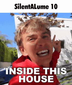 a man in a red hoodie is making a funny face with the words inside this house
