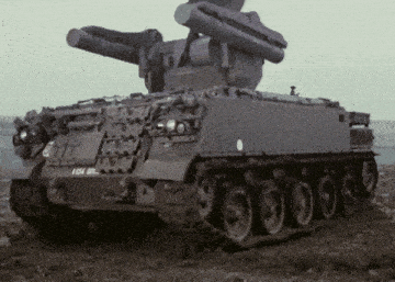 a military tank with a license plate that says 12554