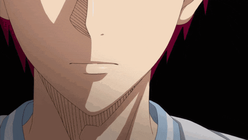 a close up of a person 's face and neck