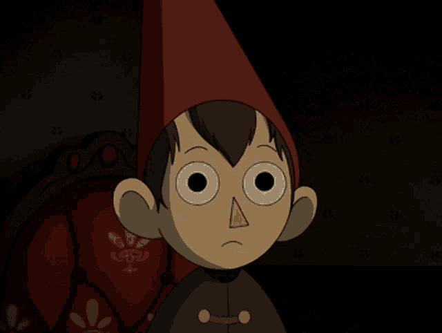 a cartoon character wearing a red hat and a cape