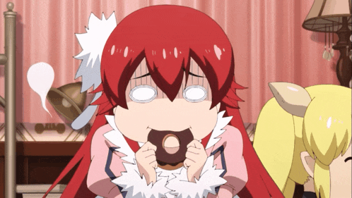 a girl with red hair is eating a donut with a surprised look on her face