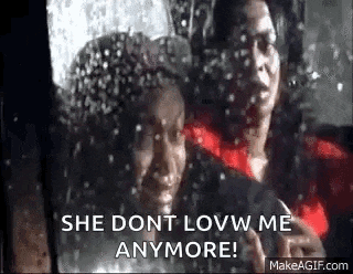 a man and a woman are sitting in a car in the rain and the woman is saying `` she dont love me anymore '' .