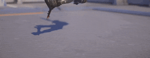 a video game character is laying on the ground with his legs up