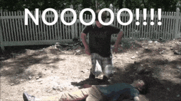 a man in an army shirt is kneeling next to a man laying on the ground with the words nooooo !!! above him