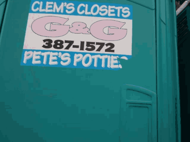 a green portable toilet with a sticker that says pete 's potties on it