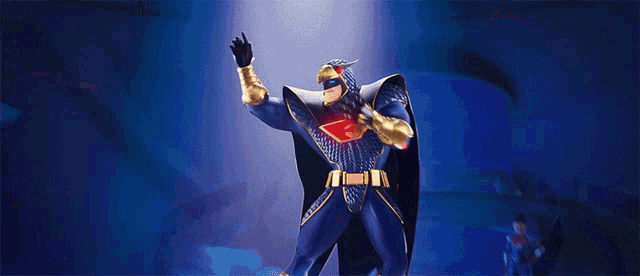 a man in a superhero costume is standing in front of flames