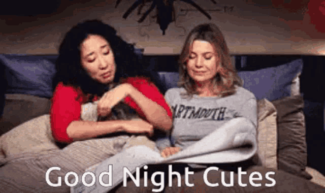two women are laying on a bed with the words good night cutes written on the bottom