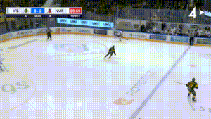 a hockey game is being played in a stadium with a score of 3-2