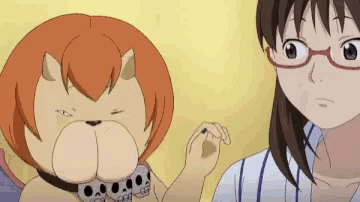 a girl with glasses is standing next to a cartoon dog