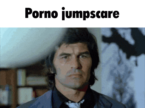 a man in a suit and tie with the words porno jumpscare written above him