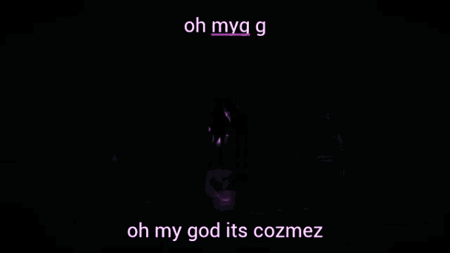 a couple standing in front of a sign that says cozmoz