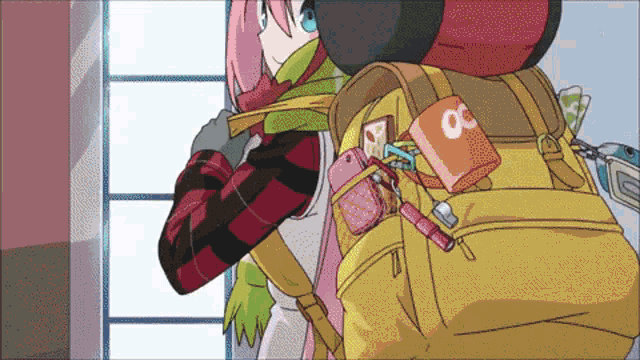 a girl in a plaid shirt is standing next to a yellow backpack with the number 30 on the front