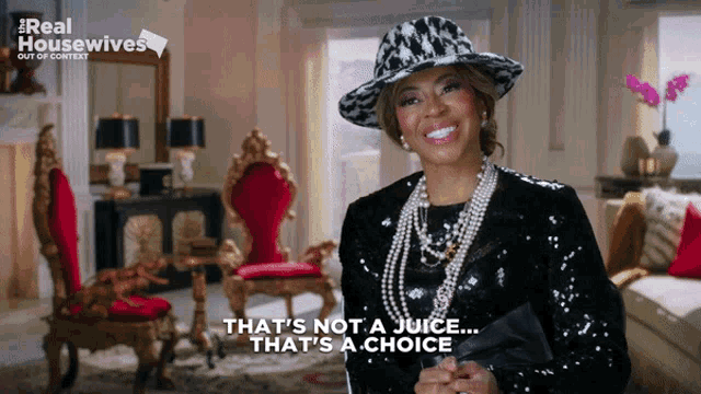 a woman wearing a hat and pearls says " that 's not a juice that 's a choice "