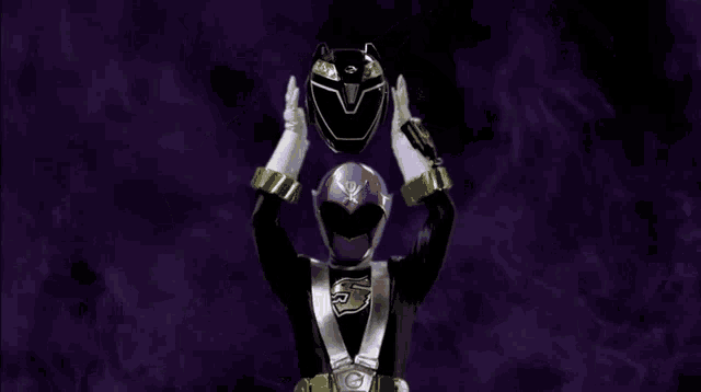 a black helmet with the number 7 on it is on a checkered background