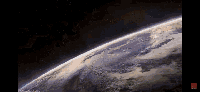 a picture of the earth from space with a youtube logo in the upper left corner