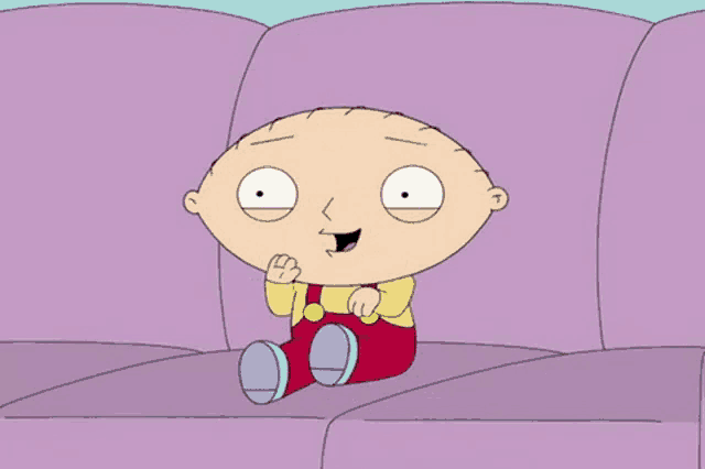 a cartoon character is sitting on a purple couch and smiling