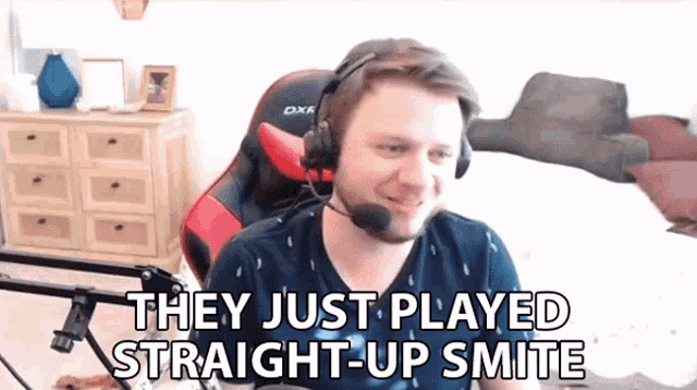 a man wearing headphones says they just played straight up smite .