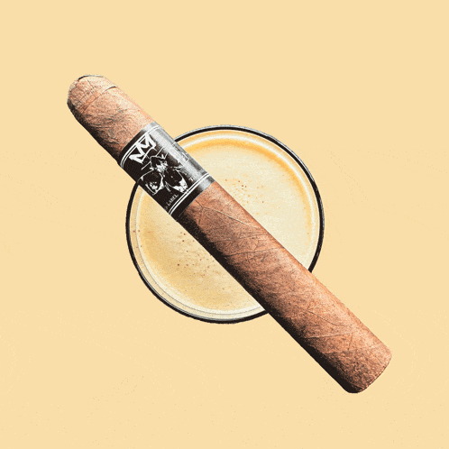 a cigar with the letter m on it