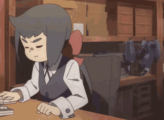 a cartoon character sitting at a desk with his eyes closed and a bow on his back
