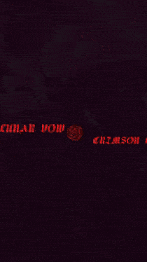 a close up of a red and white background with a blurred image