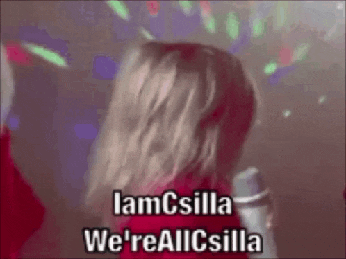 a woman singing into a microphone with the words " iamcsilla we 'reallcsilla " on the bottom