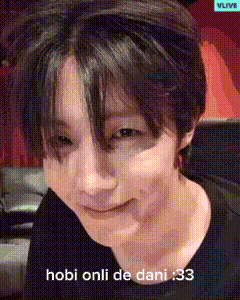 a close up of a person 's face with the words hobi onli de dani