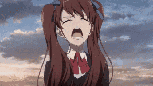 a girl with red hair is crying with her mouth open