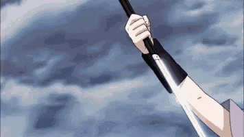 a person is holding a sword in their hand with a cloudy sky in the background .