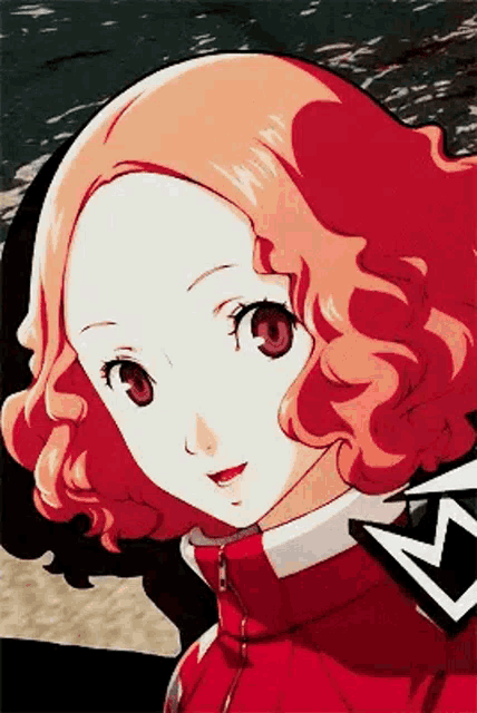 a close up of a person 's face with a red jacket on .