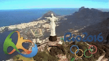 an aerial view of the rio 2016 olympics with a statue of jesus in the foreground