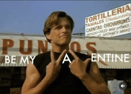 a man giving the middle finger in front of tortilleria