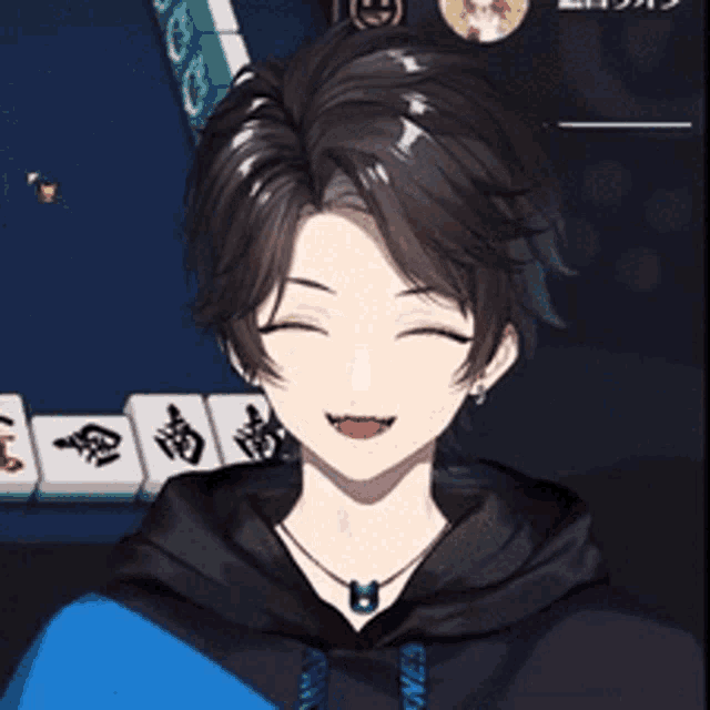a girl with blue eyes is wearing a black hoodie