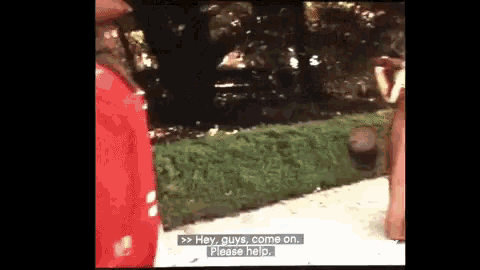 a woman in a red dress is standing next to a man in a red jacket and says hey guys come on please help ..