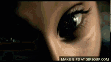 a close up of a woman 's eye with the words make gifs at gifsoup.com underneath it