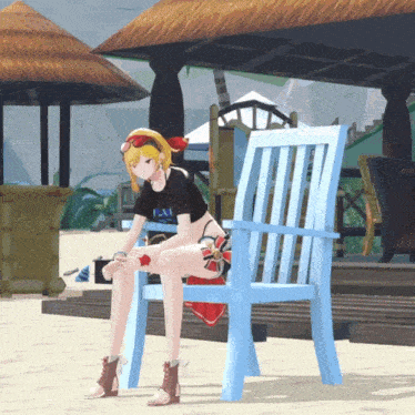 a girl is sitting on a blue chair with a t-shirt that says " la "