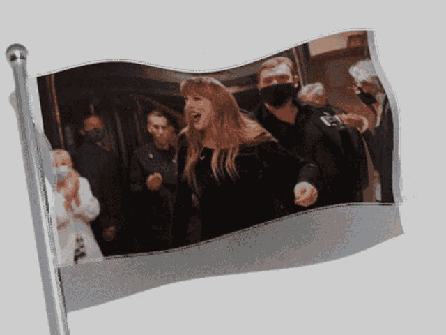 a flag with a picture of a woman screaming