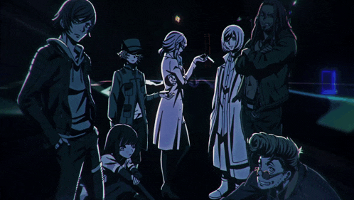a group of people standing in a dark room