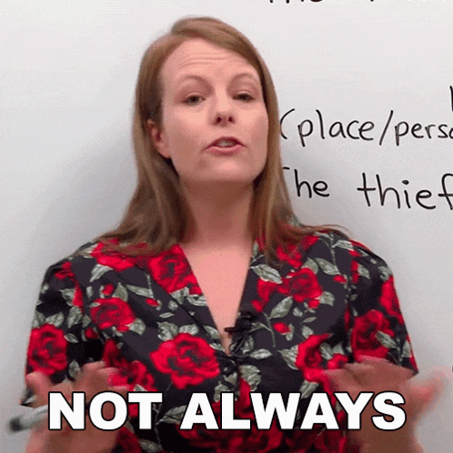 a woman in a floral shirt says not always in front of a whiteboard