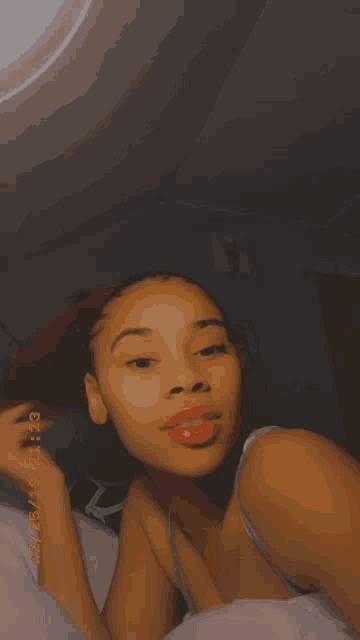 a photo of a girl taken on february 23rd at 2123