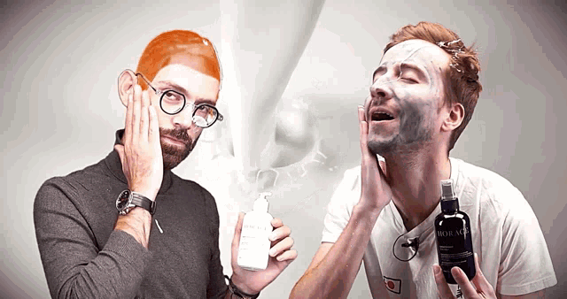 a man with a mask on his face holds a bottle that says homme