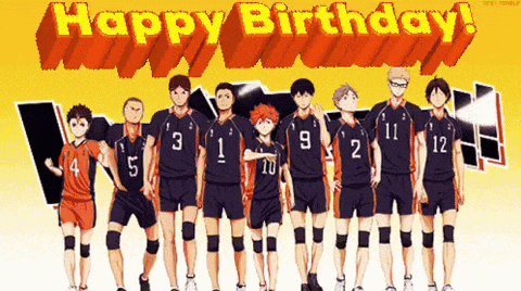 a group of volleyball players standing next to each other in front of a sign that says happy birthday .