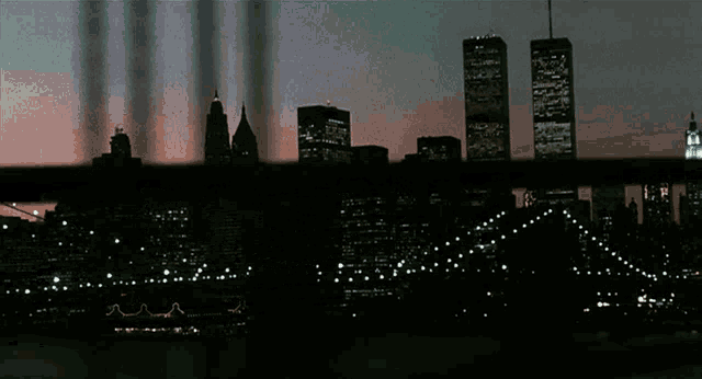 the twin towers are visible behind a bridge