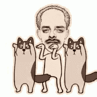 a man is standing next to two cats that are holding his hand .