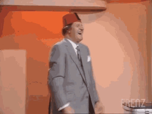 Funny Tommy Cooper GIF - Funny Tommy Cooper Laugh GIFs