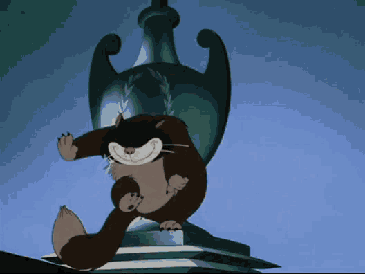 a cartoon cat is standing on a pedestal in front of a trophy