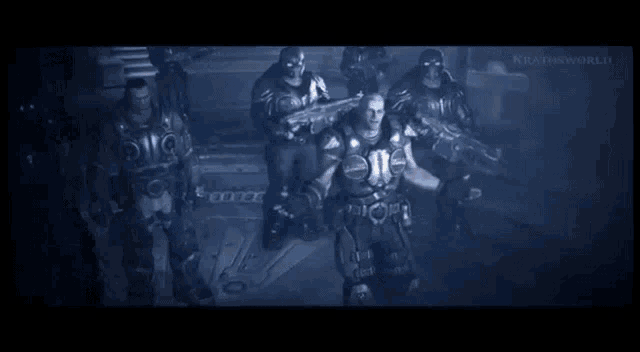 a group of soldiers are standing in a dark room holding guns .
