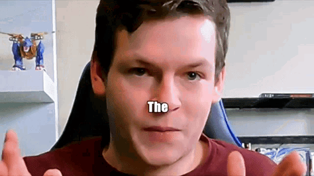 a man with a sticker on his nose that says the on it