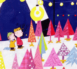 two peanuts characters are standing in the snow surrounded by pink and yellow christmas trees